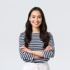 Lifestyle, people emotions and casual concept. Confident nice smiling asian woman cross arms chest confident, ready to help, listening to coworkers, taking part conversation.